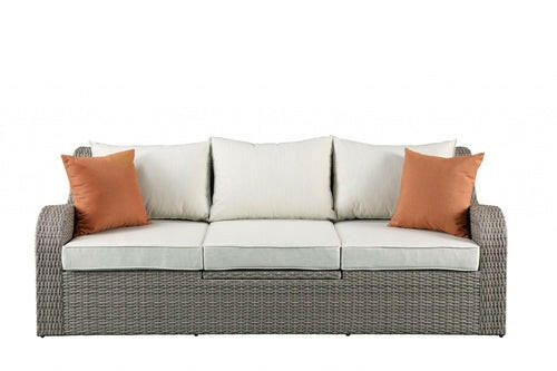 3 Piece Gray Wicker Patio Sectional And Ottoman Set.