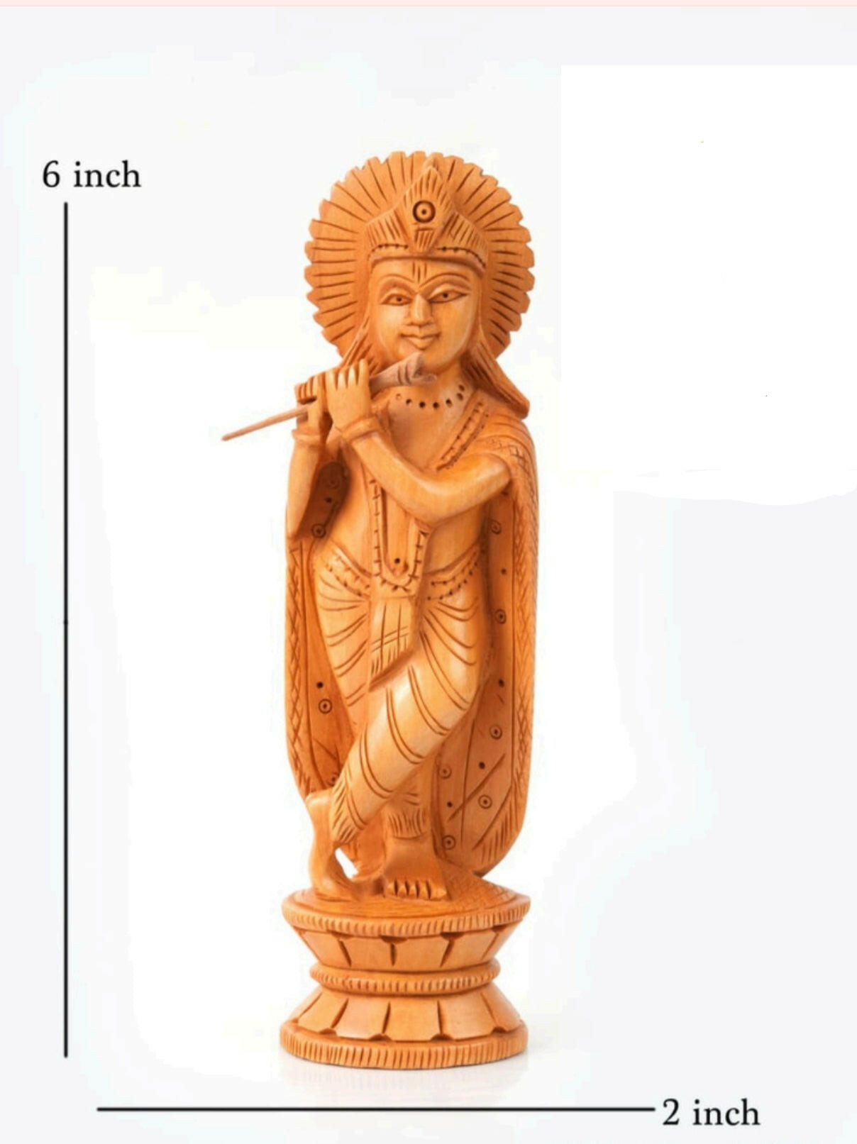 Wooden krishna idol.