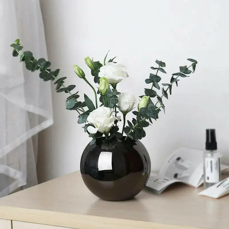 Round Glossy Metal Vase.